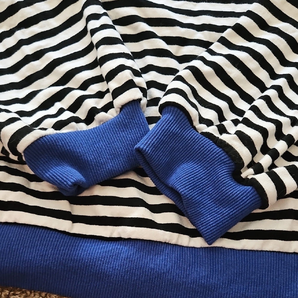 Striped Black and White Sweater with Blue Accents